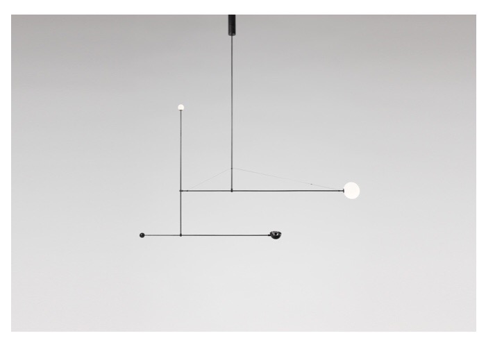 Michael Anastassiades: Mobile Chandelier 1, 2008. Black patinated brass, mouth blown opaline spheres.