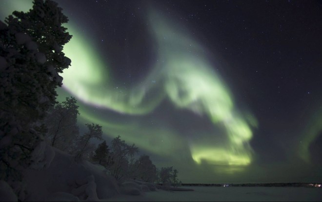 Lapland is illuminated by the aurora borealis over Inari, Finland Lehtikuva/Irene Stachon/Reuters The Times, Wednesday 27 December 2017